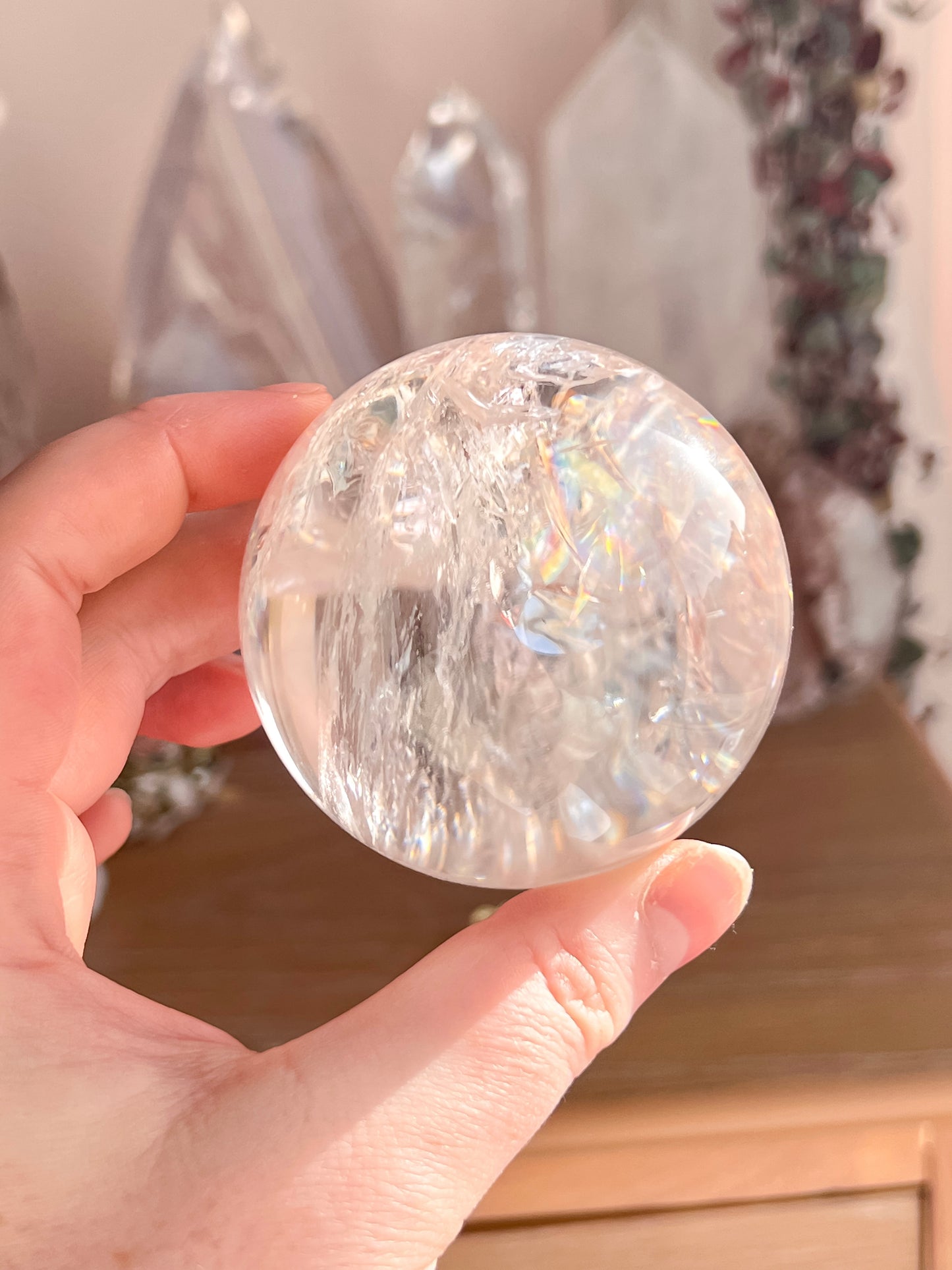 Rainbow clear quartz with hematite inclusions