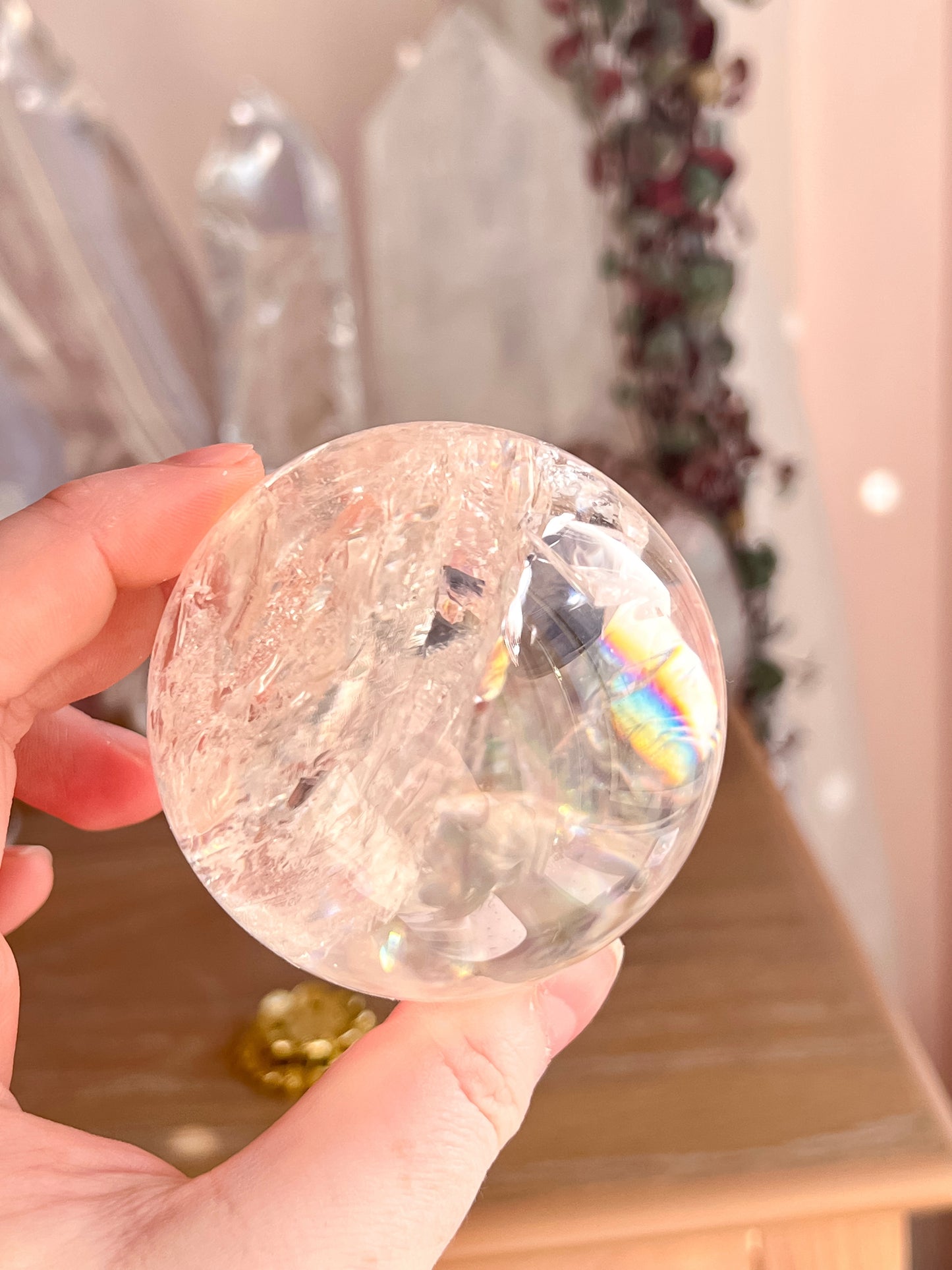 Rainbow clear quartz with hematite inclusions