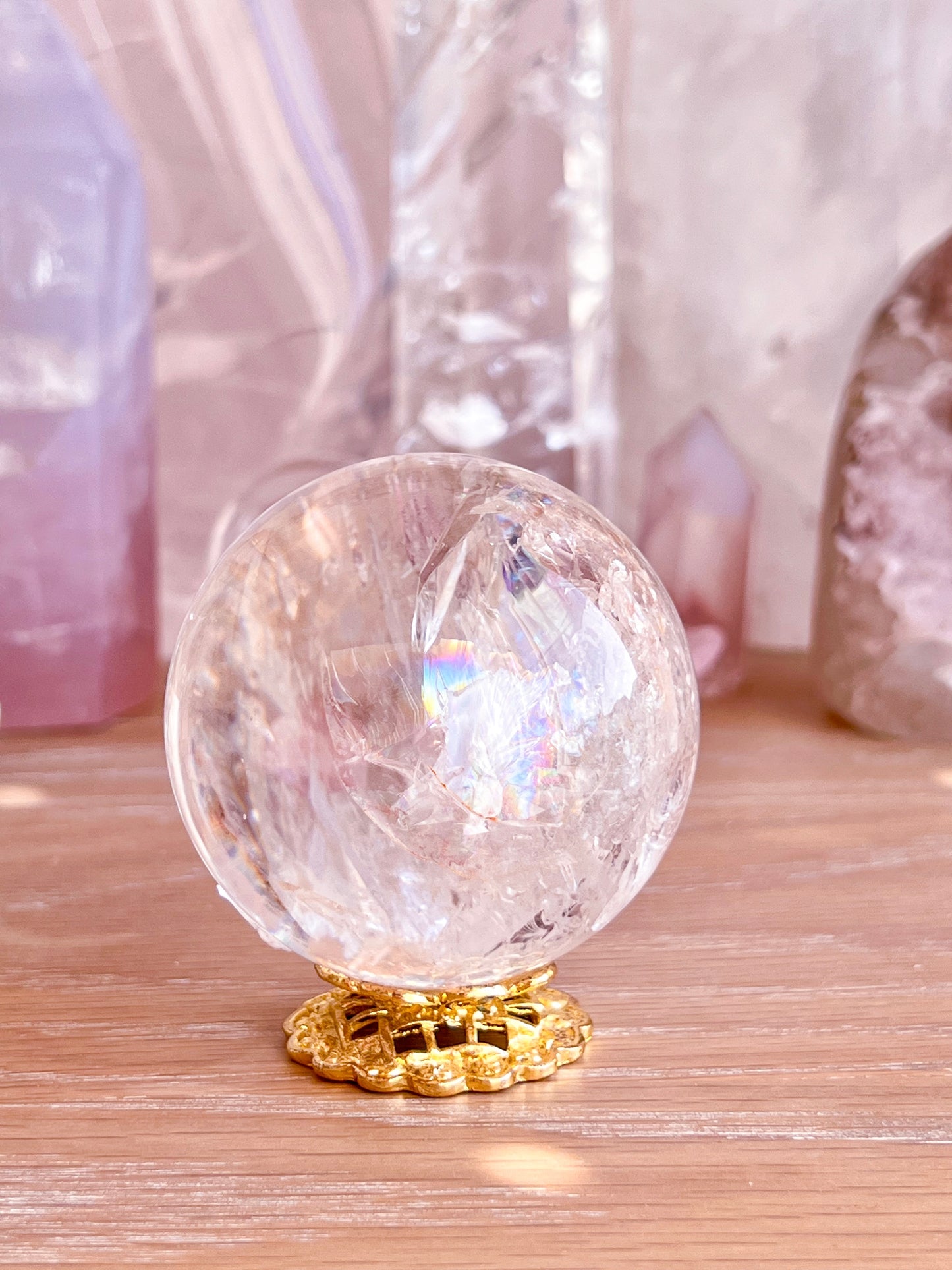 Rainbow clear quartz with hematite inclusions