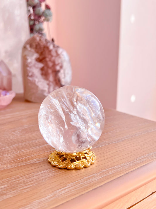 Rainbow clear quartz with hematite inclusions