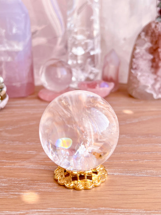 Rainbow clear quartz with hematite inclusions