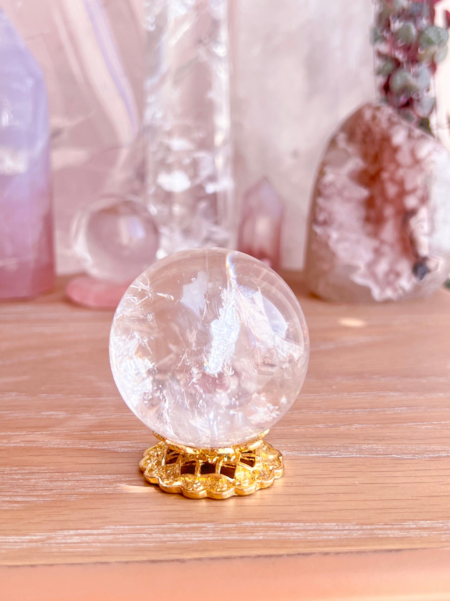 Rainbow clear quartz with hematite inclusions