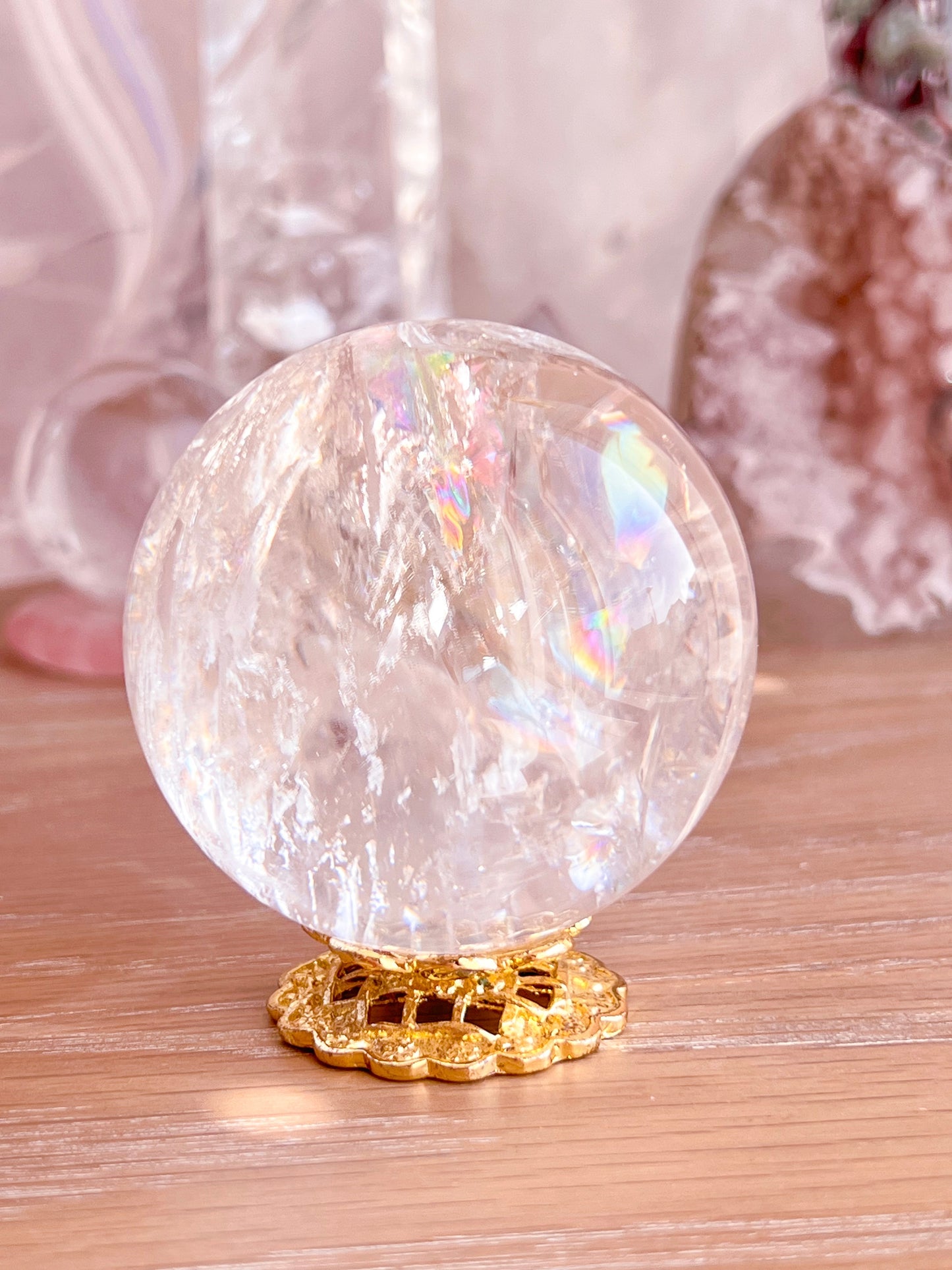 Rainbow clear quartz with hematite inclusions